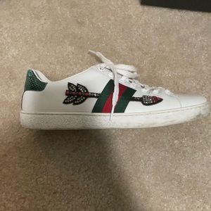 Gucci sneakers with Swarovski crystal detailing.